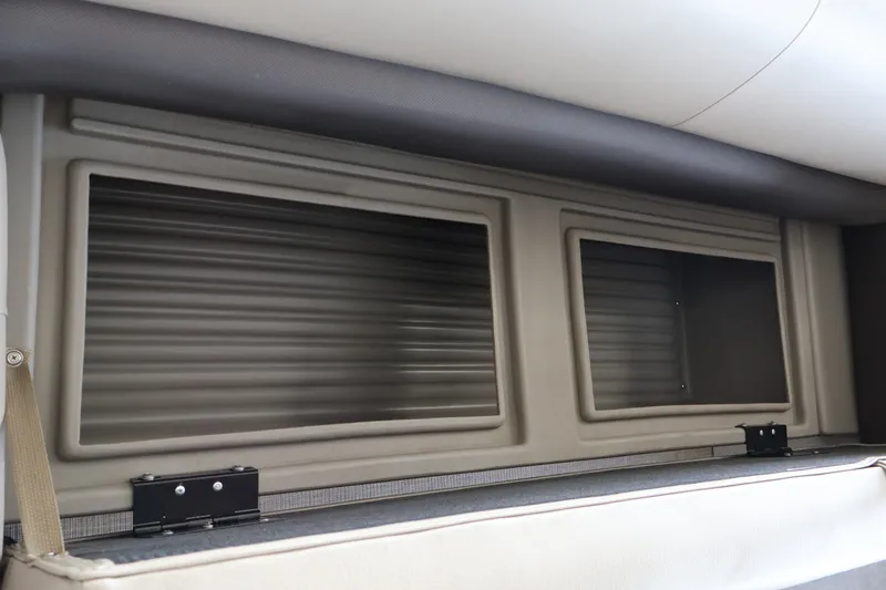 Slide: The Image of Interior storage compartment of 2025 Sun Tracker Party Barge 18 DLX pontoon boat. - 26