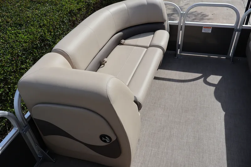 Slide: The Image of 2025 Sun Tracker Party Barge 18 DLX interior seating with beige upholstery. - 13