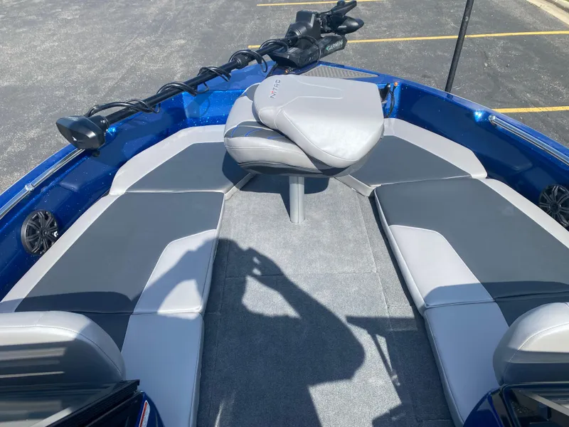 Slide: The Image of 2025 Nitro ZV19 Sport Pro boat interior with gray seating and blue accents. - 5