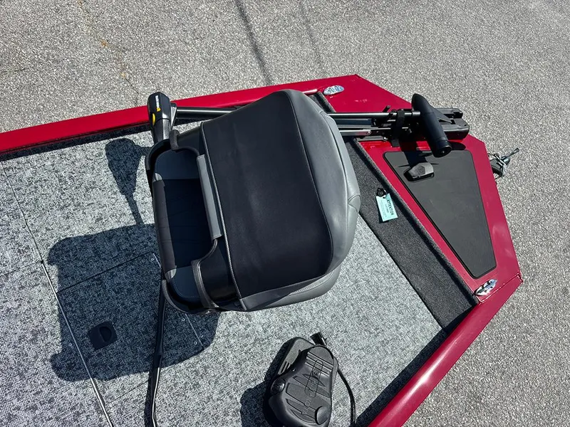 Slide: The Image of 2025 Tracker Pro 170 boat deck with seat and trolling motor, featuring red and gray design. - 12
