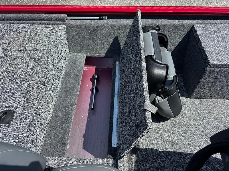 Slide: The Image of 2025 Tracker Pro 170 boat interior with storage compartment and seat. - 19