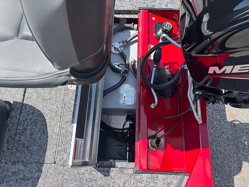 Slide: The Image of 2025 Tracker Pro 170 boat interior with engine and seating details. - 23