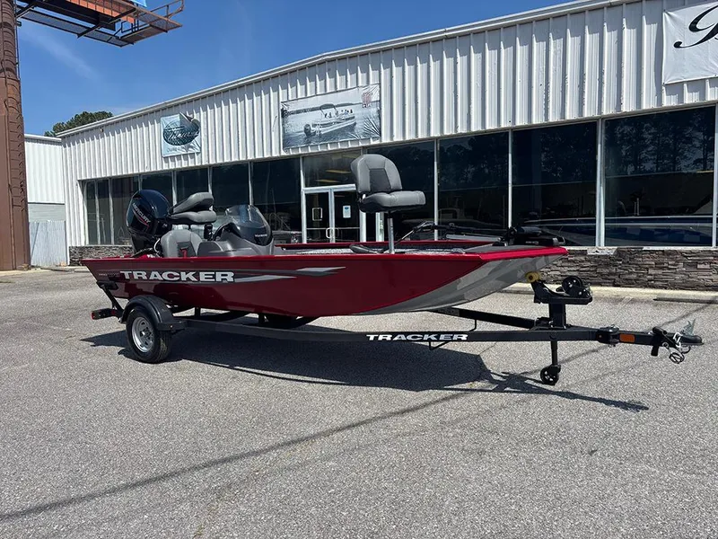 Slide: The Image of 2025 Tracker Pro 170 boat on trailer, parked outside a dealership. - 4