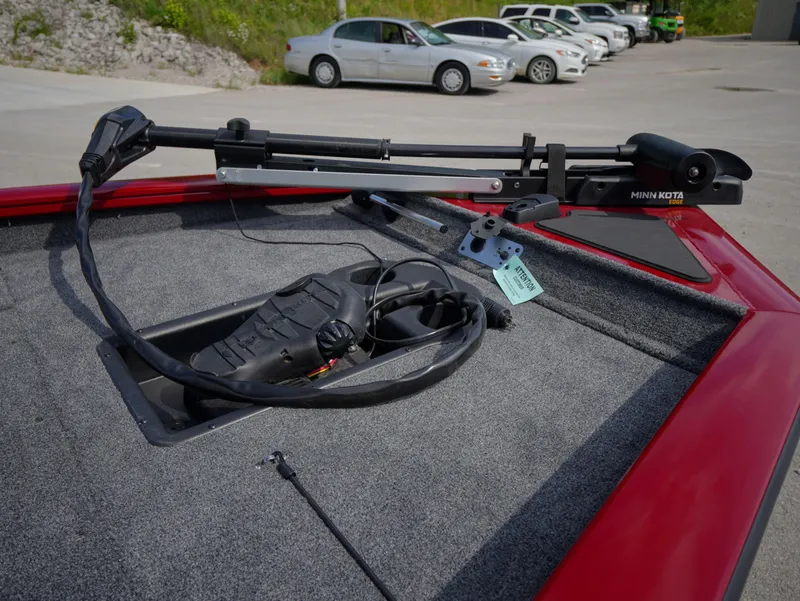 Slide: The Image of 2025 Tracker Pro Team 175 boat with Minn Kota trolling motor on deck. - 7