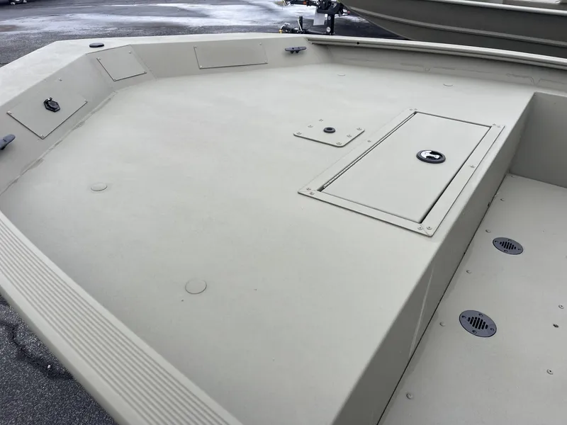 Slide: The Image of 2025 Tracker Grizzly 1860 CC boat deck, spacious and durable design. - 3