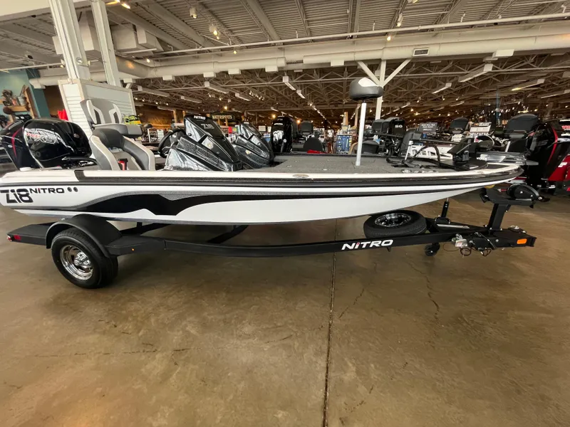 The Image of 2025 Nitro Z18 Pro boat displayed indoors on a trailer. - 0