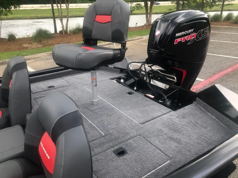Slide: The Image of 2025 Tracker Pro Team 190 boat with Mercury Pro XS engine, featuring gray and red seating. - 12