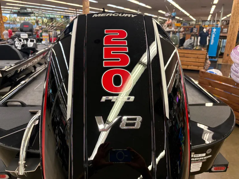 Slide: The Image of Mercury 250 Pro V8 engine on 2025 Tracker Savage 215 boat in showroom. - 9