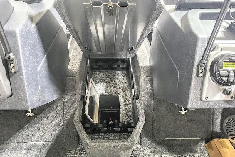 Slide: The Image of 2025 Tracker Pro Guide V-175 Combo boat interior storage compartment open. - 6