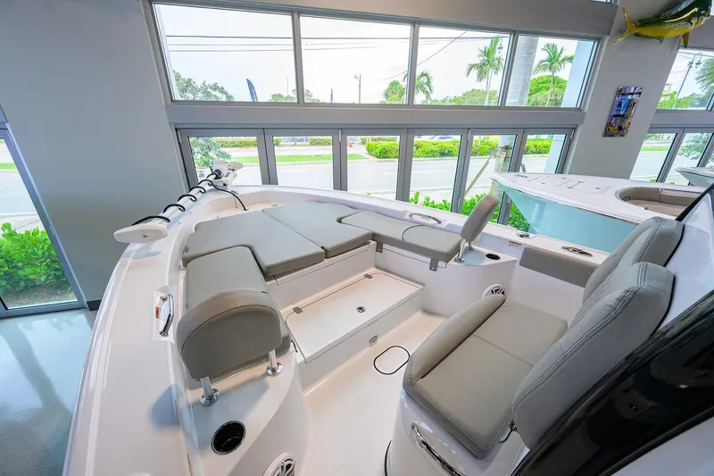 The Image of 2025 Sportsman Masters 267 Bay Boat interior with cushioned seating and modern design. - 1