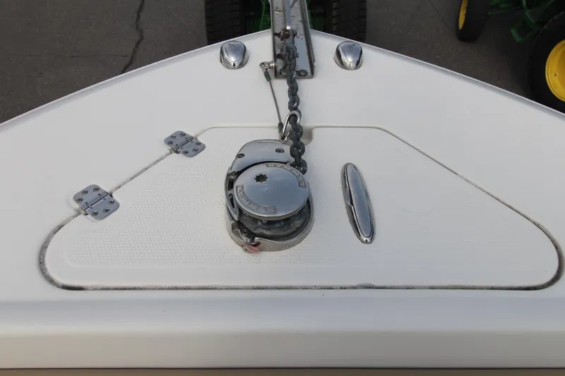 Slide: The Image of Bow of 2017 Sailfish 236 CC boat with anchor chain and winch. - 10