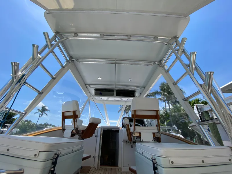 Slide: The Image of Interior view of 1995 L&H 33 boat with seating and clear sky background. - 27