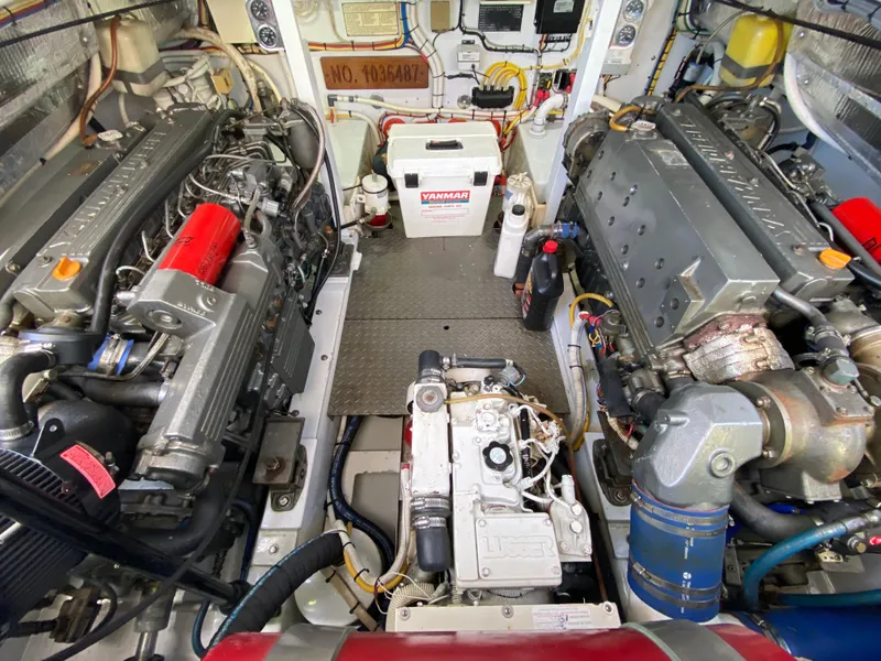 Slide: The Image of Engine room of a 1995 L&H 33 boat with dual Yanmar engines. - 68