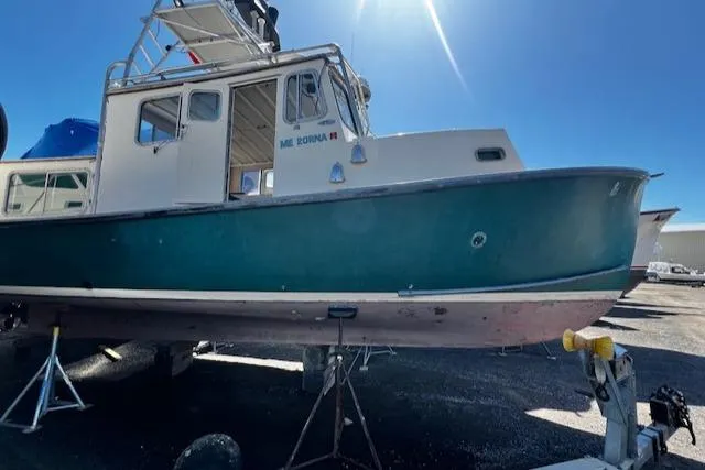 Slide: The Image of 1978 Bruno & Stillman Custom Cruiser/Sportfisherman boat on trailer under bright sunlight. - 35