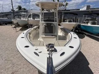 Slide: The Image of 2025 Key West 239 FS boat displayed in a marina, surrounded by other vessels. - 10