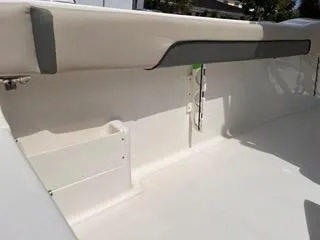Slide: The Image of 2025 Key West 239 FS boat interior, featuring sleek white design and modern fittings. - 18