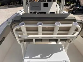 Slide: The Image of 2025 Key West 239 FS boat interior with rod holders and Garmin equipment. - 24