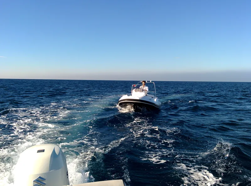 Slide: The Image of 2025 Zar Formenti 49 SL boat cruising on open sea under clear blue sky. - 21