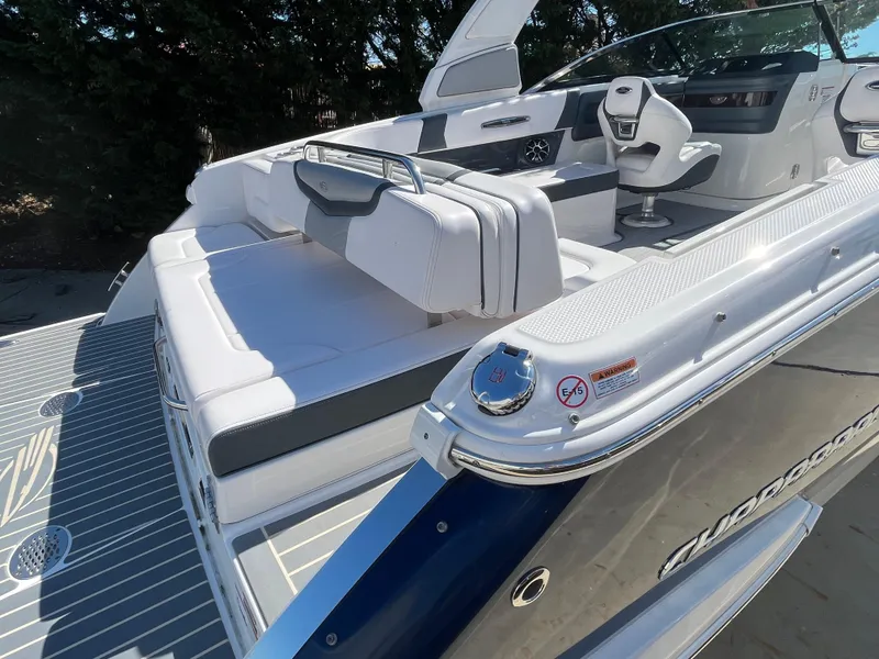Slide: The Image of 2019 Chaparral 277 SSX boat with sleek seating and modern interior design. - 11