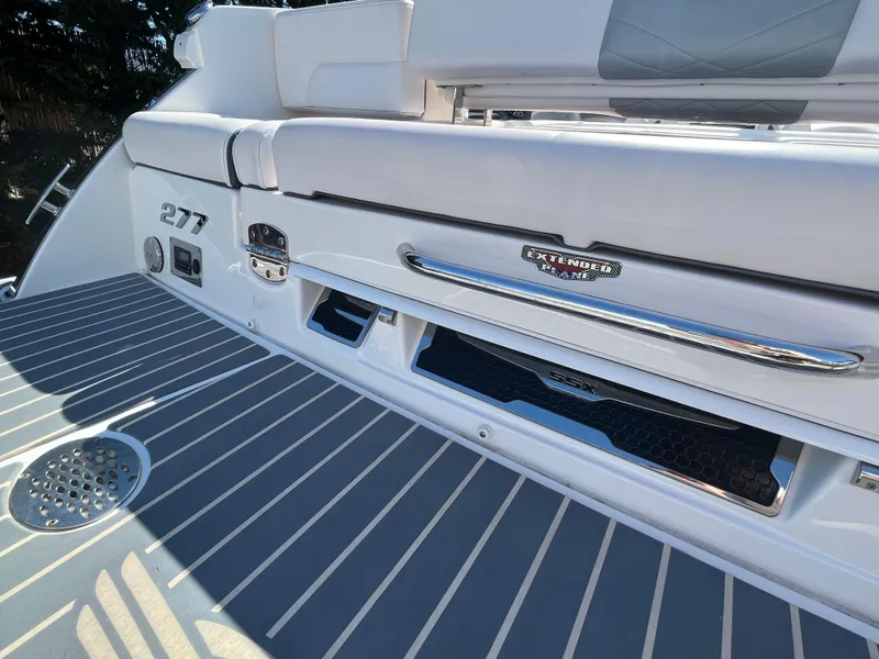 Slide: The Image of 2019 Chaparral 277 SSX boat deck with sleek design and stainless steel accents. - 13