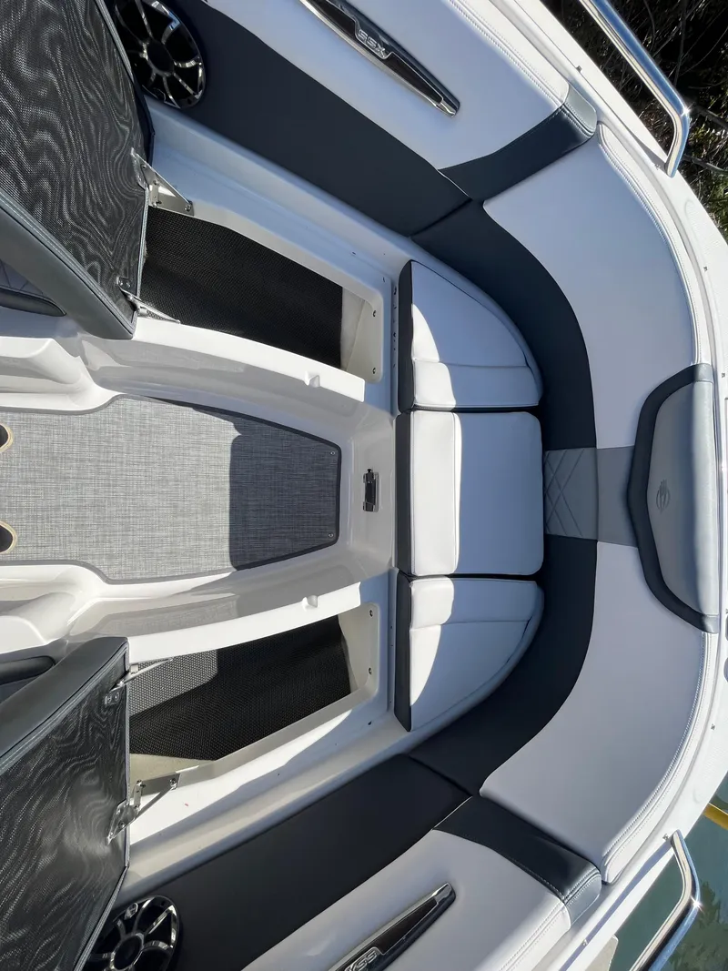 Slide: The Image of 2019 Chaparral 277 SSX boat interior with sleek seating and modern design. - 38