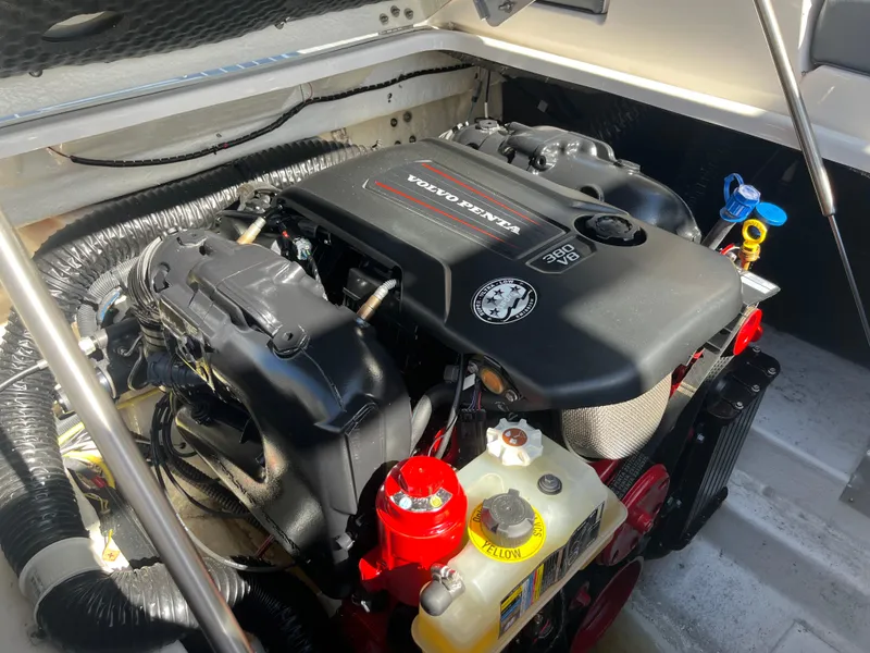 Slide: The Image of 2019 Chaparral 277 SSX boat engine, featuring a Volvo Penta motor in an open compartment. - 45