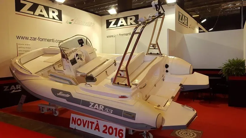 Slide: The Image of Zar Formenti 59 SL/Limited 2025 model displayed at a boat show. - 17