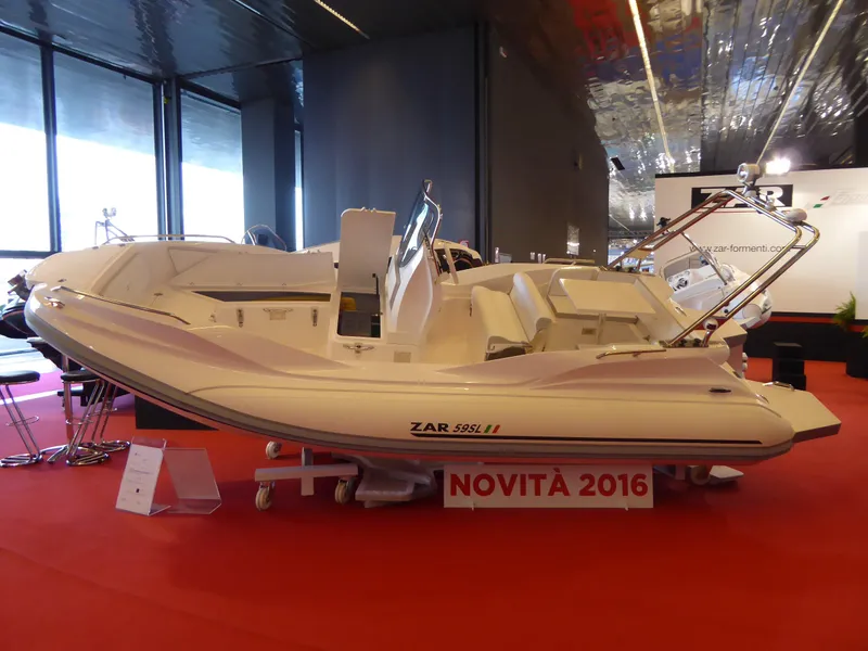 Slide: The Image of 2025 Zar Formenti 59 SL/Limited boat displayed at an indoor exhibition. - 22