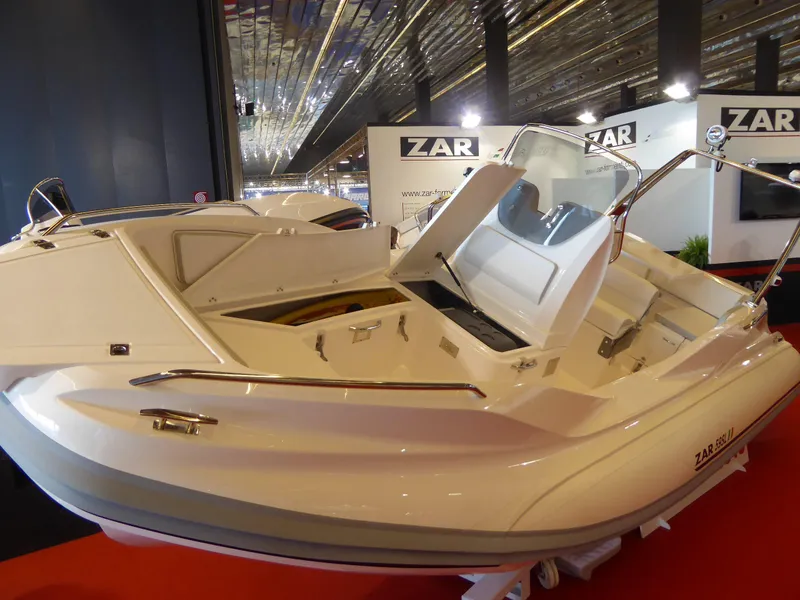 Slide: The Image of 2025 Zar Formenti 59 SL/Limited boat displayed at an indoor exhibition. - 24