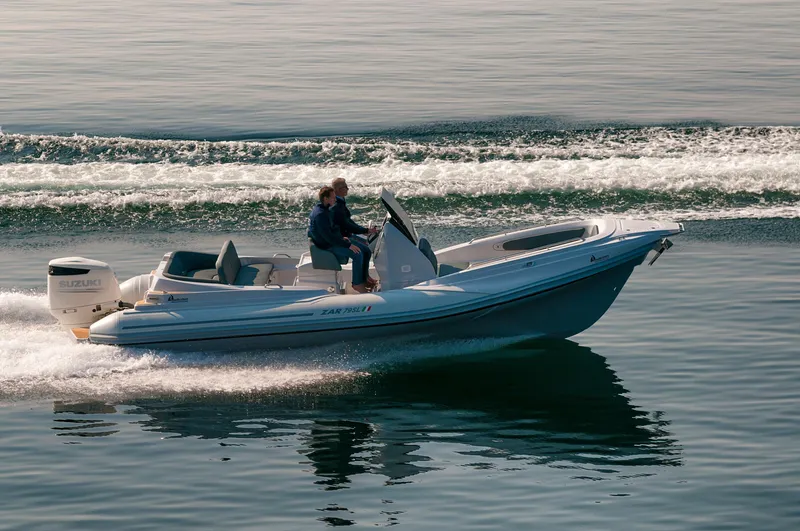 Slide: The Image of 2025 Zar Formenti 79 SL boat cruising on calm water. - 1