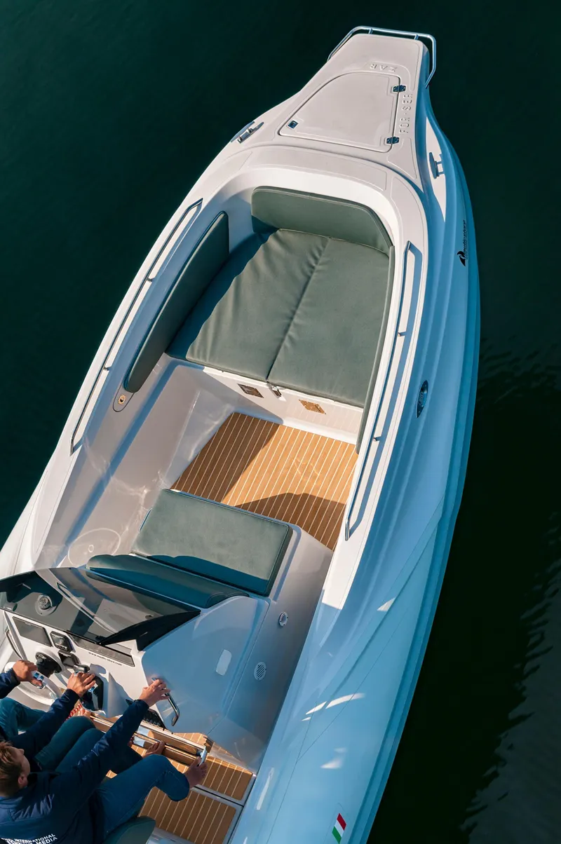 Slide: The Image of 2025 Zar Formenti 79 SL boat with sleek design and spacious seating on water. - 4