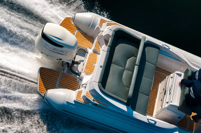 Slide: The Image of 2025 Zar Formenti 79 SL boat cruising on water, featuring sleek design and powerful engine. - 5