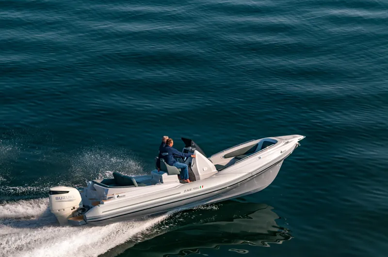 Slide: The Image of 2025 Zar Formenti 79 SL boat cruising on open water. - 6