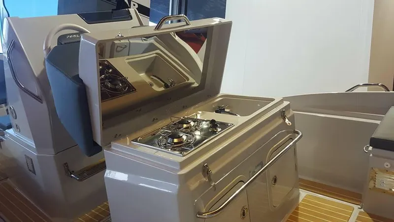 Slide: The Image of 2025 Zar Formenti 79 SL boat interior with modern kitchen setup. - 7