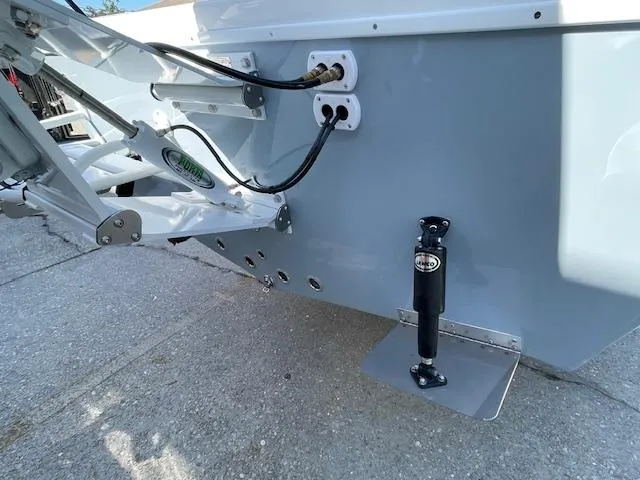 Slide: The Image of 1986 Aquasport Tournament 222 boat transom with trim tabs and wiring. - 10