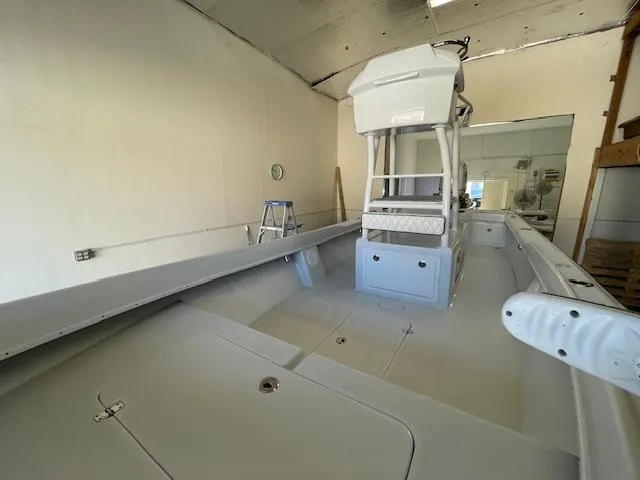 Slide: The Image of 1986 Aquasport Tournament 222 boat interior in a garage setting. - 27