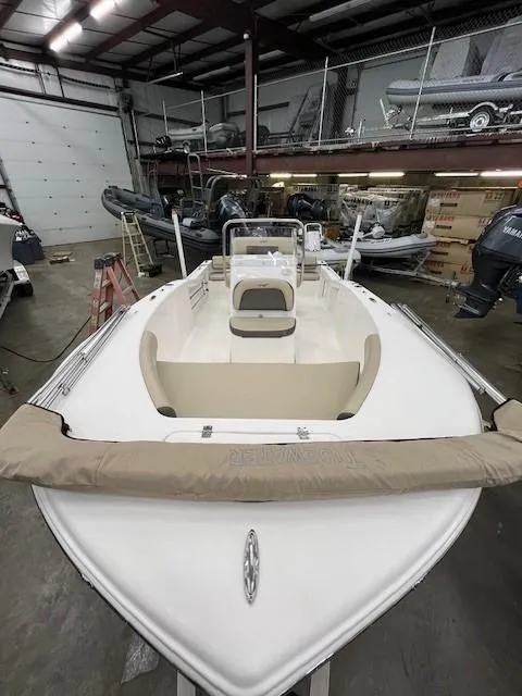Slide: The Image of 2019 Tidewater 180CC Adventure boat in indoor storage facility. - 12