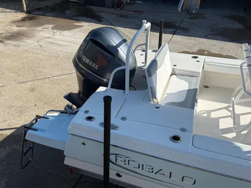 Slide: The Image of 2021 Robalo 246 Cayman boat with Yamaha outboard motor, rear view. - 7