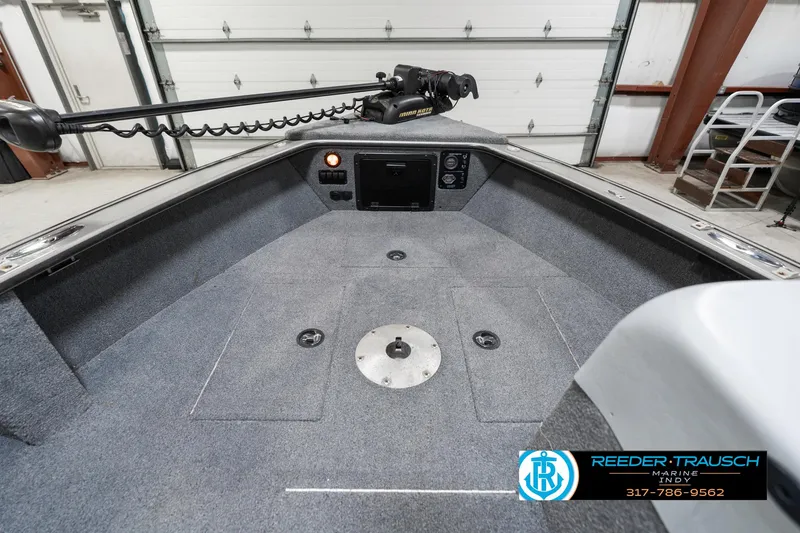 Slide: The Image of 2001 Lund 1775 Pro V SE boat interior with trolling motor and control panel. - 16
