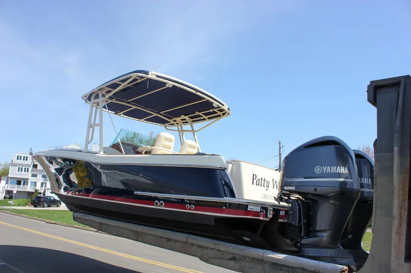 Slide: The Image of 2014 Chris-Craft Catalina 29 Sun Tender on trailer with Yamaha engines. - 35