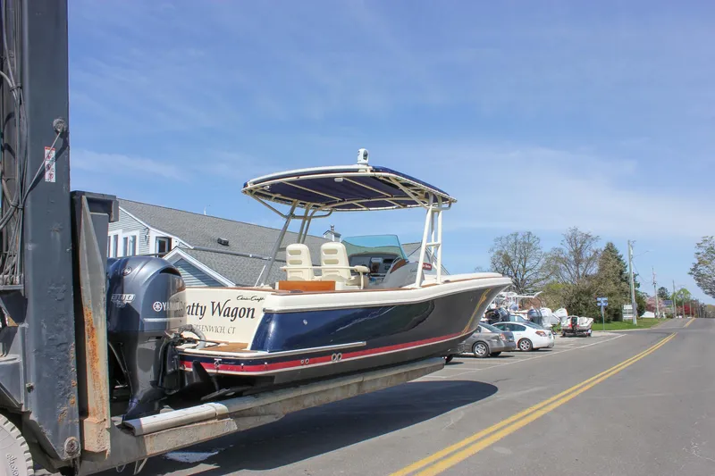 Slide: The Image of 2014 Chris-Craft Catalina 29 Sun Tender on forklift, street view, clear sky. - 36