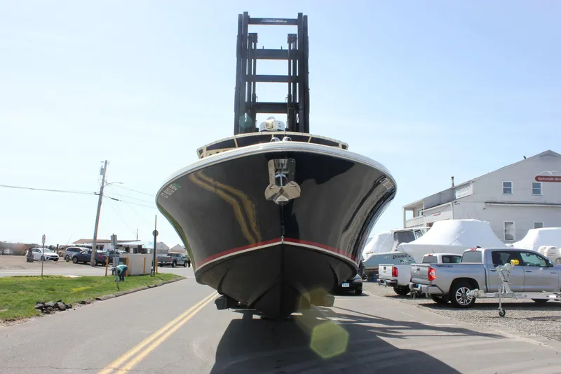 Slide: The Image of 2014 Chris-Craft Catalina 29 Sun Tender on forklift, street view, sunny day. - 42