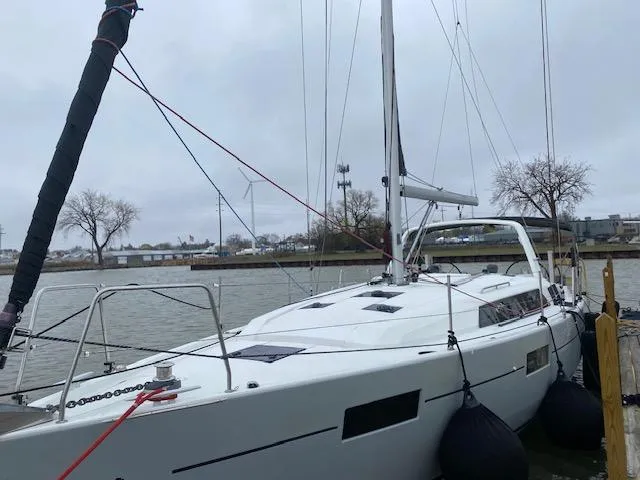 Slide: The Image of 2017 Beneteau Oceanis 41.1 sailboat docked on a cloudy day. - 4
