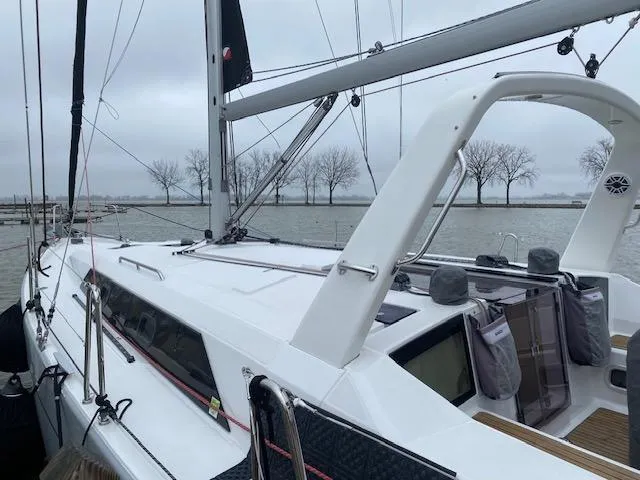 Slide: The Image of 2017 Beneteau Oceanis 41.1 sailboat docked on a cloudy day. - 6
