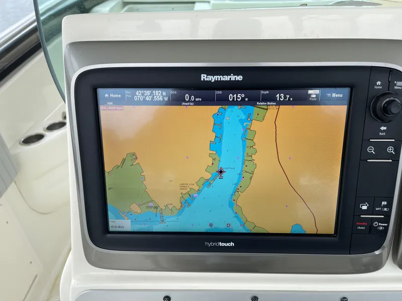 Slide: The Image of Raymarine navigation display on 2005 Hydra-Sports 3300 VX boat, showing nautical chart. - 7