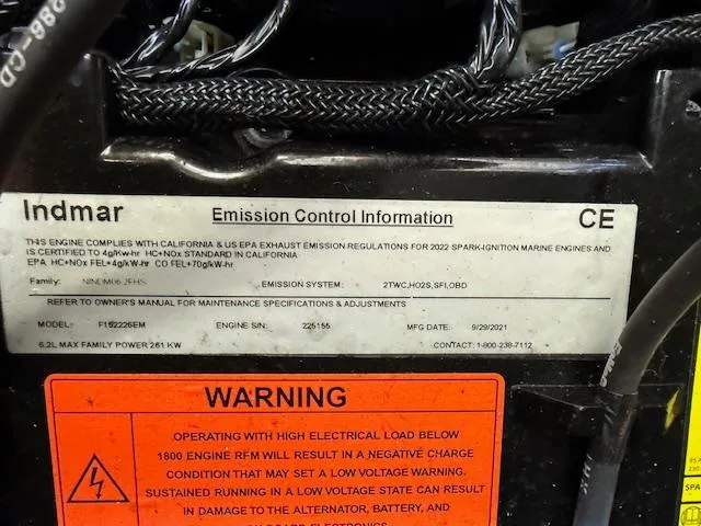 Slide: The Image of 2022 MB B-52 engine emission control label with warning notice and specifications. - 13