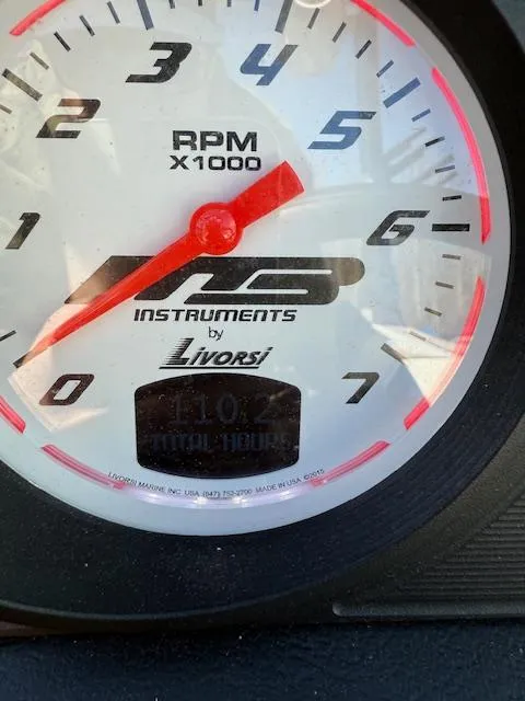 Slide: The Image of Close-up of MB B-52 2022 RPM gauge by Livorsi, showing 410.2 total hours. - 18