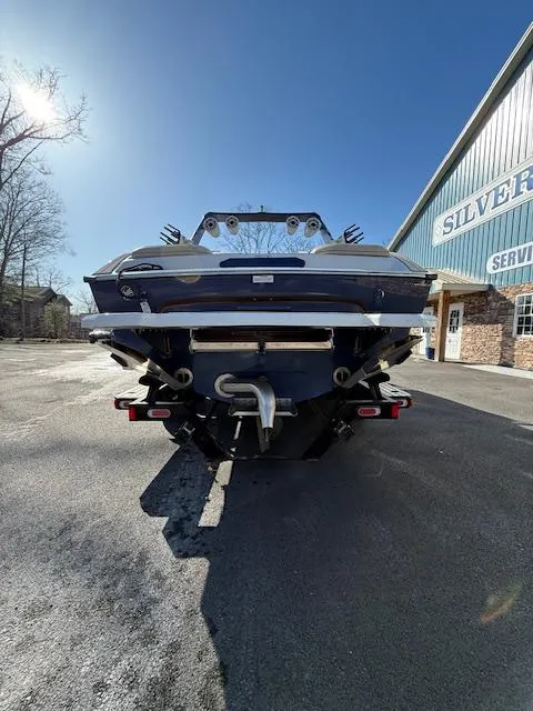 Slide: The Image of 2022 MB B-52 boat rear view at dealership, sunny day. - 9