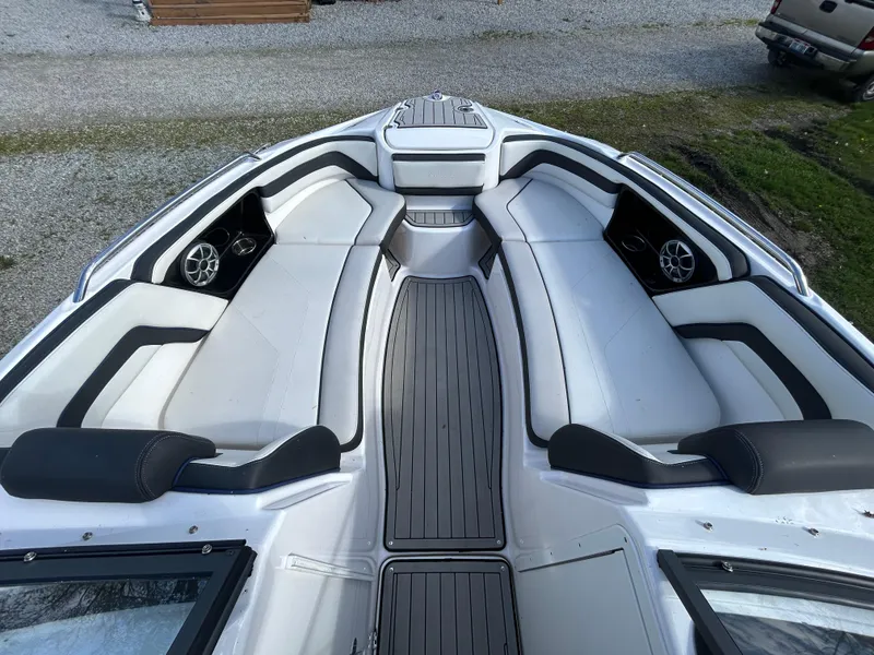 Slide: The Image of 2020 Yamaha Boats 242 Limited S interior with sleek seating and modern design. - 12