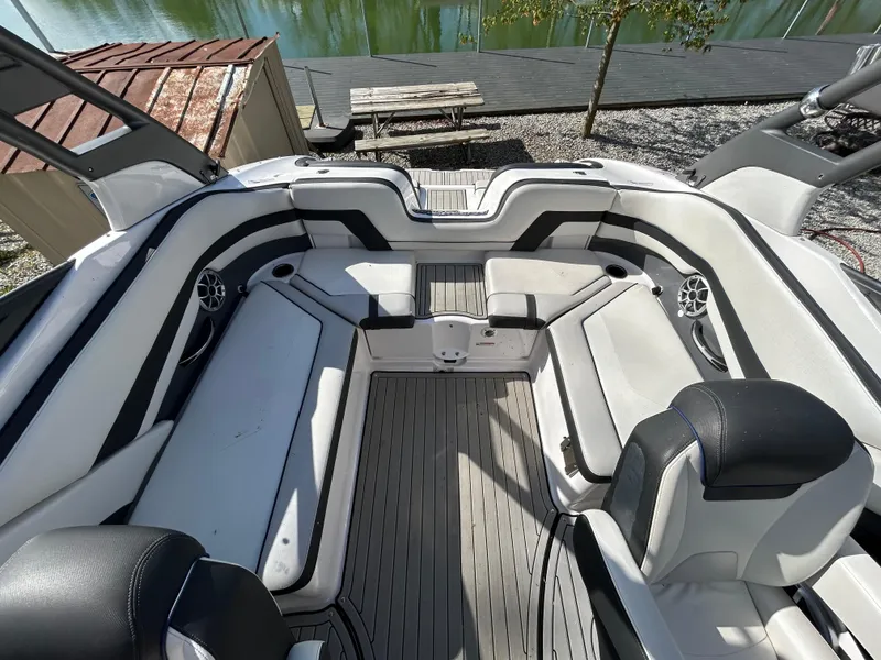 Slide: The Image of 2020 Yamaha Boats 242 Limited S interior with sleek seating and modern design. - 22